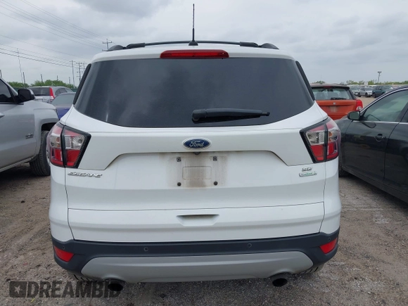 2017 Ford Escape SE with VIN 1FMCU0GD0HUD19621, listed as a IAAI auction lot 42123026 with 105,664 mi miles and . Bid and sale history available at carsss.com. Image 16.