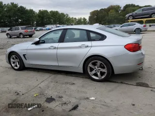 2015 BMW 4 Series 428i xDrive with VIN WBA4C9C5XFG135391, listed as a Copart auction lot 70753653 with 70,870 mi miles and . Bid and sale history available at DreamBid. Image 2.