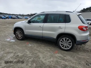 2010 Volkswagen Tiguan with VIN WVGAV9AX7AW514556, listed as a Copart auction lot 45373655 with 94,751 mi miles and Salvage Title. Bid and sale history available at DreamBid. Image 2.