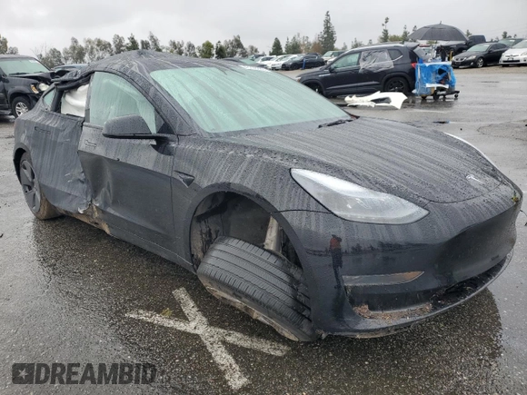 2023 Tesla Model 3 with VIN 5YJ3E1EA2PF671865, listed as a Copart auction lot 45220285 with 29,614 mi miles and Salvage title. Bid and sale history available at DreamBid. Image 4.