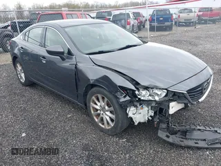 2016 Mazda 6 i Sport with VIN JM1GJ1U55G1472416, listed as a IAAI auction lot 41961622 with 157,315 mi miles and . Bid and sale history available at DreamBid. Image 1.