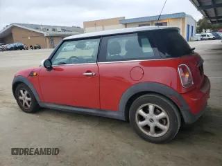 2010 MINI Hardtop with VIN WMWMF3C52ATZ63438, listed as a Copart auction lot 54424245 with 107,201 mi miles and Clean Title. Bid and sale history available at DreamBid. Image 2.