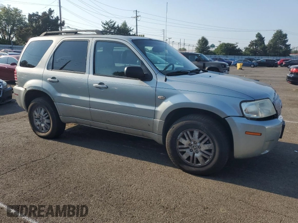 2005 Mercury Mariner Luxury z VIN 4M2CU57125DJ16694, wystawiony jako Copart lot #69063704 z przebiegiem 222 793 mil mil oraz Szkoda całkowita • Salvage title. Historia ofert i sprzedaży dostępna na DreamBid. Obrazek 4.