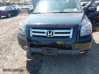 2007 Honda Pilot EX-L with VIN 2HKYF18537H502361, listed as a IAAI auction lot 42039836 with 167,431 mi miles. Bid and sale history available at carsss.com. Image 6.