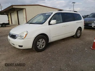 2012 Kia Sedona LX with VIN KNDMG4C79C6502438, listed as a Copart auction lot 77833384 with 169,459 mi miles and Clean Title. Bid and sale history available at carsss.com. Image 1.