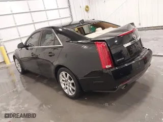 2009 Cadillac CTS AWD w/1SB with VIN 1G6DT57V490106183, listed as a IAAI auction lot 41593354 with 71,332 mi miles. Bid and sale history available at carsss.com. Image 3.