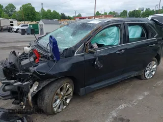 2020 Ford Edge Titanium z VIN 2FMPK4K98LBB12684, wystawiony jako IAAI lot #42134532 z przebiegiem 103 786 mil mil oraz . Historia ofert i sprzedaży dostępna na DreamBid. Obrazek 2.