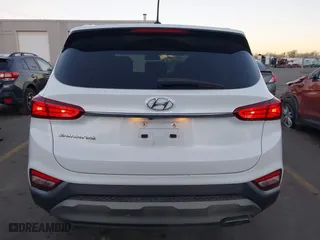 2019 Hyundai Santa Fe SE with VIN 5NMS23AD9KH077362, listed as a IAAI auction lot 41890584 with 132,476 mi miles. Bid and sale history available at carsss.com. Image 16.
