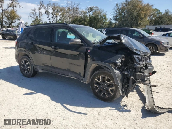 2019 Jeep Compass Trailhawk with VIN 3C4NJDDBXKT629955, listed as a Copart auction lot 47613695 with 113,820 mi miles and Salvage Title. Bid and sale history available at DreamBid. Image 4.