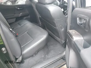 2018 Toyota Tacoma SR5 with VIN 3TMDZ5BN4JM047379, listed as a IAAI auction lot 39529466 with Not provided miles and . Bid and sale history available at DreamBid. Image 8.