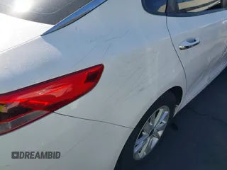 2016 Kia Optima LX z VIN KNAGT4L38G5102885, wystawiony jako IAAI lot #42229044 z przebiegiem 102 416 mil mil oraz . Historia ofert i sprzedaży dostępna na DreamBid. Obrazek 13.