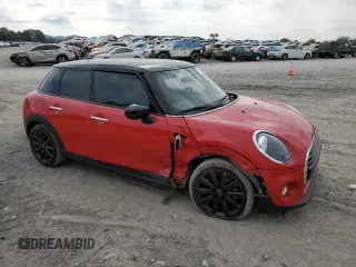 2021 MINI Hardtop 4 Door Oxford Edition z VIN WMWXU7C08M2N49721, wystawiony jako Copart lot #77983324 z przebiegiem 64 096 mil mil oraz Szkoda całkowita • Salvage title. Historia ofert i sprzedaży dostępna na DreamBid. Obrazek 4.