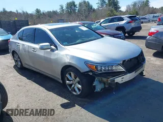 2014 Acura RLX with VIN JH4KC1F3XEC002575, listed as a IAAI auction lot 41972287 with 126,636 mi miles. Bid and sale history available at carsss.com. Image 1.