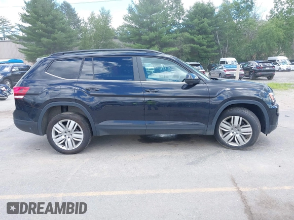 2020 Volkswagen Atlas SE z VIN 1V2UR2CA7LC504330, wystawiony jako IAAI lot #39755712 z przebiegiem 79 892 mil mil oraz . Historia ofert i sprzedaży dostępna na DreamBid. Obrazek 13.