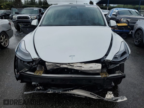 2022 Tesla Model Y Performance with VIN 7SAYGDEF3NF390848, listed as a Copart auction lot 49441025 with 42,488 mi miles and Salvage Title. Bid and sale history available at DreamBid. Image 5.