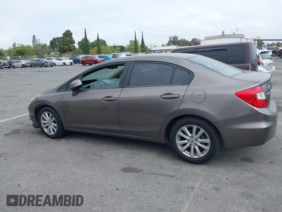 2012 Honda Civic EX with VIN 2HGFB2F89CH517330, listed as a IAAI auction lot 42116208 with 196,861 mi miles and . Bid and sale history available at DreamBid. Image 14.