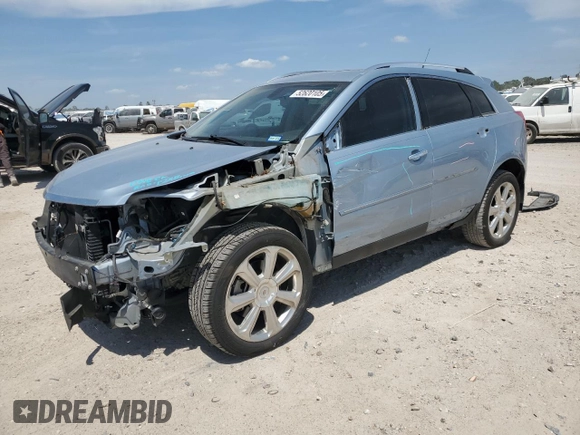 2013 Cadillac SRX Performance Collection with VIN 3GYFNDE37DS535759, listed as a Copart auction lot 52620105 with 92,059 mi miles and Salvage title. Bid and sale history available at DreamBid. Image 1.