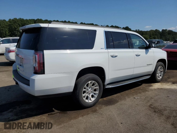 2019 GMC Yukon XL SLT with VIN 1GKS1GKCXKR239712, listed as a Copart auction lot 74721584 with 143,690 mi miles and Salvage Title. Bid and sale history available at carsss.com. Image 3.