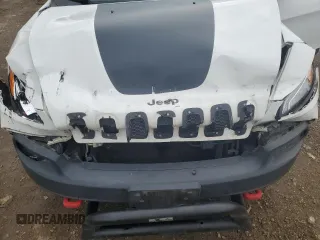 2016 Jeep Cherokee Trailhawk with VIN 1C4PJMBS8GW359461, listed as a Copart auction lot 57950705 with 146,124 mi miles and Salvage title. Bid and sale history available at DreamBid. Image 11.