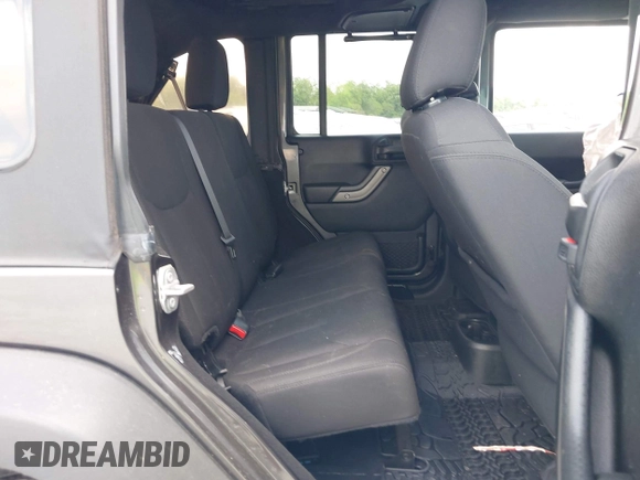 2018 Jeep Wrangler Unlimited Sport with VIN 1C4BJWDG4JL814233, listed as a IAAI auction lot 42112347 with 104,113 mi miles and . Bid and sale history available at DreamBid. Image 8.