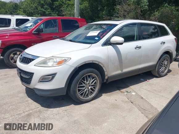 2010 Mazda CX-9 Grand Touring with VIN JM3TB2MA2A0206516, listed as a IAAI auction lot 42599987 with 199,229 mi miles and . Bid and sale history available at DreamBid. Image 2.