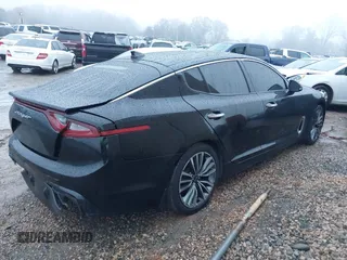2019 Kia Stinger with VIN KNAE15LA6K6069504, listed as a IAAI auction lot 41031373 with 81,577 mi miles. Bid and sale history available at carsss.com. Image 4.