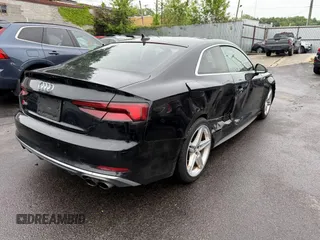 2018 Audi S5 Premium Plus with VIN WAUP4AF59JA077177, listed as a IAAI auction lot 42218794 with 86,654 mi miles and . Bid and sale history available at DreamBid. Image 4.