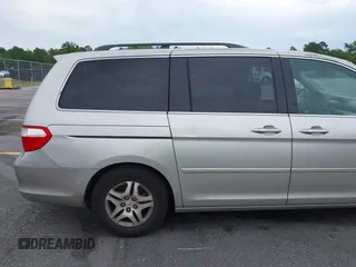 2007 Honda Odyssey EX-L z VIN 5FNRL38647B426620, wystawiony jako IAAI lot #42059093 z przebiegiem 258 622 mil mil oraz . Historia ofert i sprzedaży dostępna na DreamBid. Obrazek 14.