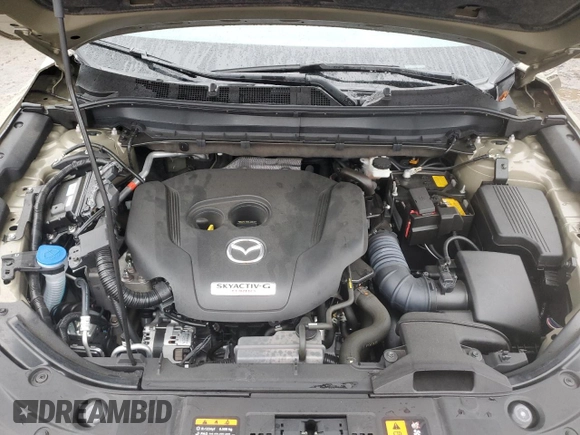 2024 Mazda CX-5 2.5 Carbon Turbo with VIN JM3KFBAY5R0419375, listed as a Copart auction lot 82000304 with 7,247 mi miles and Salvage Title. Bid and sale history available at carsss.com. Image 12.