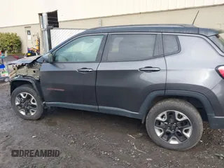 2017 Jeep Compass Trailhawk with VIN 3C4NJDDB9HT657173, listed as a IAAI auction lot 41613348 with 60,781 mi miles and . Bid and sale history available at DreamBid. Image 15.