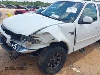 1999 Ford F-150 XL with VIN 1FTRX18L5XNA50607, listed as a IAAI auction lot 42626517 with Not provided miles and . Bid and sale history available at DreamBid. Image 6.
