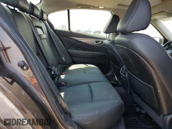 2015 Infiniti Q50 Premium с VIN JN1BV7AR7FM421900, выставлен на аукционе Copart как лот 58426305 с пробегом 125 467 миль миль и Списание • Salvage title. История ставок и продаж доступна на DreamBid. Изображение 10.