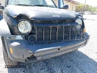 2007 Jeep Liberty Sport with VIN 1J4GL48K37W520729, listed as a IAAI auction lot 42072490 with 115,095 mi miles. Bid and sale history available at carsss.com. Image 6.