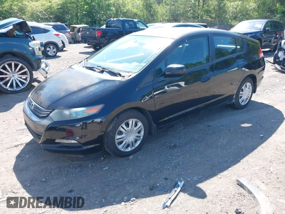 2010 Honda Insight LX with VIN JHMZE2H5XAS018840, listed as a IAAI auction lot 42138165 with 188,467 mi miles and . Bid and sale history available at DreamBid. Image 2.