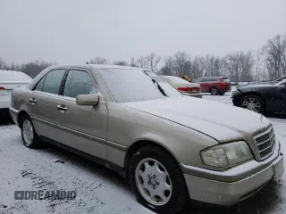 1994 Mercedes-Benz C with VIN WDBHA28E6RF015428, listed as a Copart auction lot 85866784 with Not Provided miles and Salvage Title. Bid and sale history available at carsss.com. Image 4.
