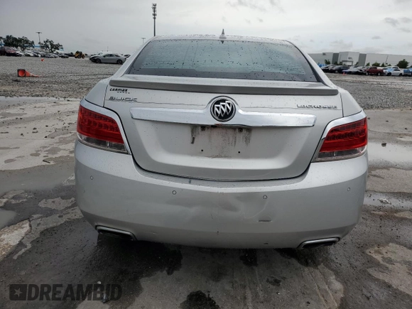 2013 Buick LaCrosse Premium 1 z VIN 1G4GF5E33DF170154, wystawiony jako Copart lot #59536615 z przebiegiem 213 717 mil mil oraz Szkoda całkowita • Salvage title. Historia ofert i sprzedaży dostępna na DreamBid. Obrazek 6.
