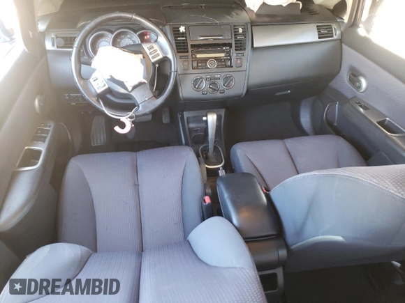 2007 Nissan Versa 1.8 SL with VIN 3N1BC11E57L407117, listed as a Copart auction lot 77336884 with 193,869 mi miles and Salvage Title. Bid and sale history available at carsss.com. Image 8.