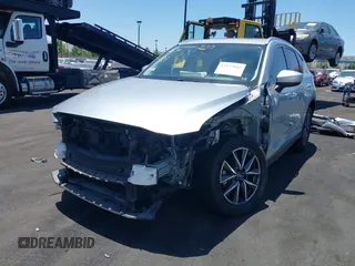 2018 Mazda CX-5 Grand Touring with VIN JM3KFBDM3J0343782, listed as a IAAI auction lot 42527044 with 60,180 mi miles and . Bid and sale history available at DreamBid. Image 6.