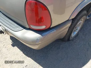 2000 Dodge Durango z VIN 1B4HS28N0YF118516, wystawiony jako IAAI lot #42339277 z przebiegiem Nie podano mil oraz . Historia ofert i sprzedaży dostępna na DreamBid. Obrazek 11.