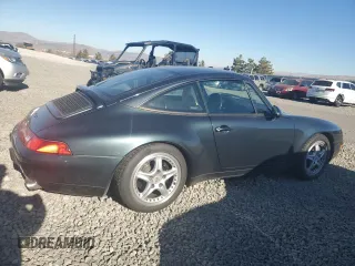 1996 Porsche 911 with VIN WP0DA2996TS385231, listed as a Copart auction lot 83699964 with 60,492 mi miles and Salvage title. Bid and sale history available at DreamBid. Image 3.