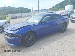 2019 Dodge Charger SXT with VIN 2C3CDXJG4KH550424, listed as a IAAI auction lot 40224159 with 56,988 mi miles and . Bid and sale history available at DreamBid. Image 17.