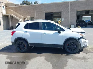 2019 Chevrolet Trax LT z VIN 3GNCJLSB6KL149942, wystawiony jako IAAI lot #42013676 z przebiegiem 116 452 mil mil oraz . Historia ofert i sprzedaży dostępna na DreamBid. Obrazek 13.