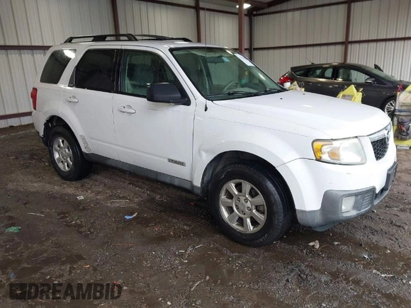 2008 Mazda Tribute ES with VIN 4F2CZ06148KM13459, listed as a IAAI auction lot 41742402 with 196,030 mi miles and . Bid and sale history available at DreamBid. Image 1.