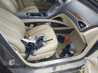 2014 Lincoln MKZ Hybrid with VIN 3LN6L2LU1ER814964, listed as a IAAI auction lot 40712613 with Not provided miles and . Bid and sale history available at DreamBid. Image 5.