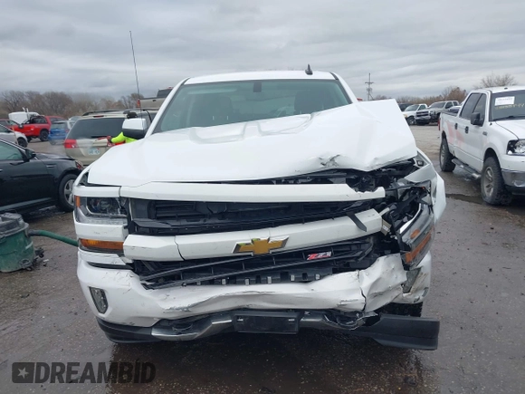 2018 Chevrolet Silverado 1500 LT with VIN 3GCUKREC3JG453433, listed as a IAAI auction lot 38138441 with 53,496 mi miles. Bid and sale history available at carsss.com. Image 12.