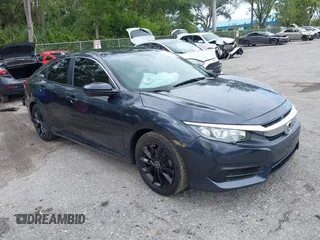 2016 Honda Civic Sedan LX with VIN 19XFC2F52GE069998, listed as a IAAI auction lot 42016233 with 93,990 mi miles. Bid and sale history available at carsss.com. Image 1.