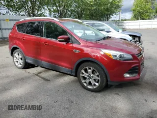 2015 Ford Escape Titanium with VIN 1FMCU9J94FUB92166, listed as a Copart auction lot 61371055 with 96,439 mi miles and Salvage title. Bid and sale history available at DreamBid. Image 4.