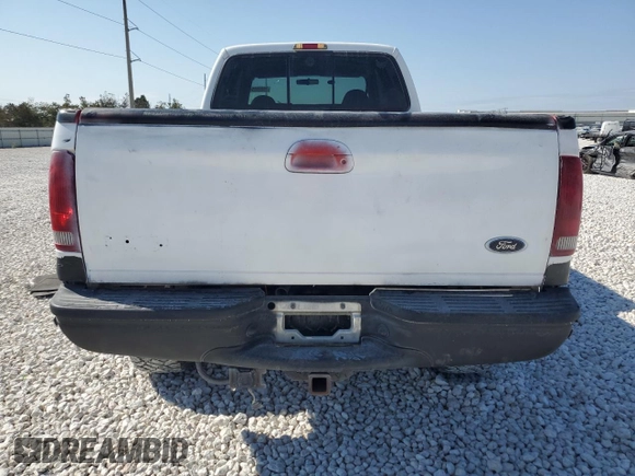 2000 Ford Super Duty F-250 XL with VIN 1FTNW21SXYEA52699, listed as a Copart auction lot 78659054 with 154,056 mi miles and Salvage Title. Bid and sale history available at carsss.com. Image 6.