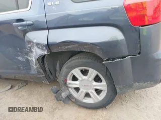 2014 GMC Terrain SLE z VIN 2GKFLRE35E6316926, wystawiony jako IAAI lot #41395057 z przebiegiem 165 055 mil mil oraz . Historia ofert i sprzedaży dostępna na DreamBid. Obrazek 6.