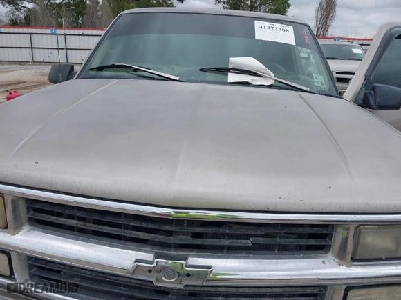 1998 Chevrolet C/K 1500 with VIN 1GCEK19R4WR145098, listed as a IAAI auction lot 41472308 with 291,454 mi miles. Bid and sale history available at carsss.com. Image 10.